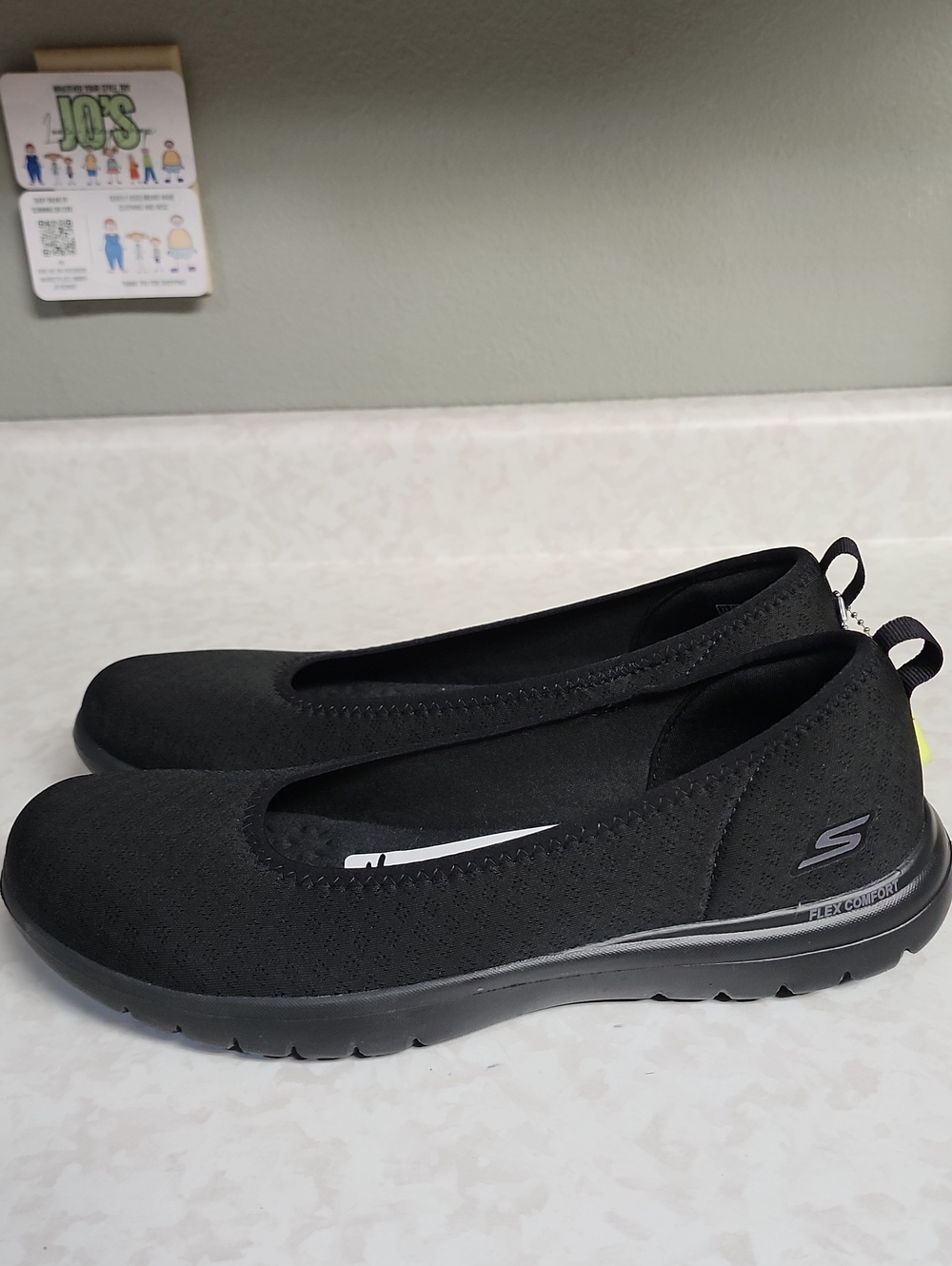 Skechers Women's 11 Black Slip-On Knit Flats number 2099
